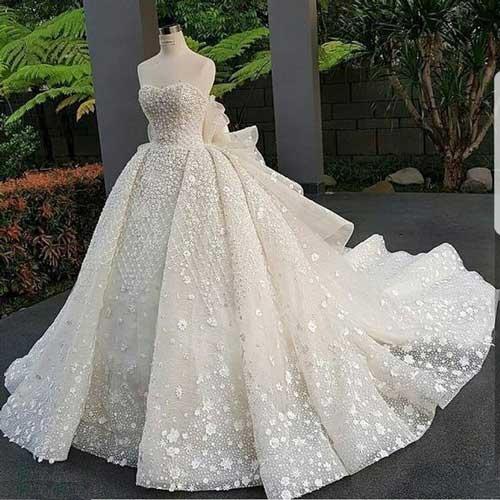 لباس عروس سنگ دوزی شده دنباله‌دار